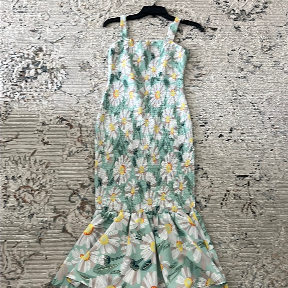 Stretchy, form fitting, forgiving figure flattering with a flare, soft material